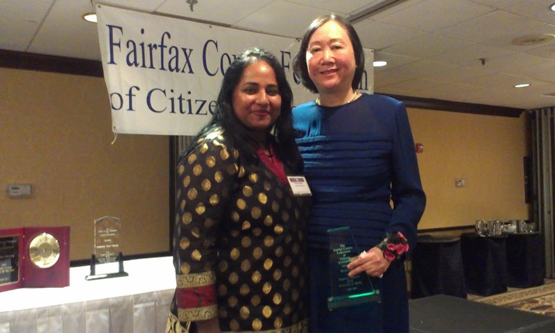 Federation President Tania Hossain and Rose Chu holding her Citation of Merit keepsake